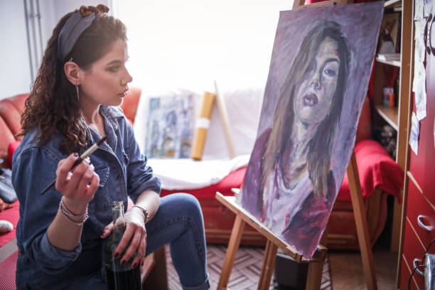istock Creative young artist painting at home. 1326156854