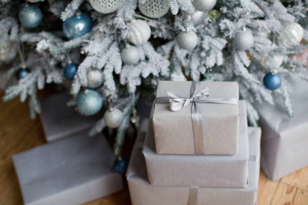 istock Craft Christmas boxes near Christmas tree 1326157456