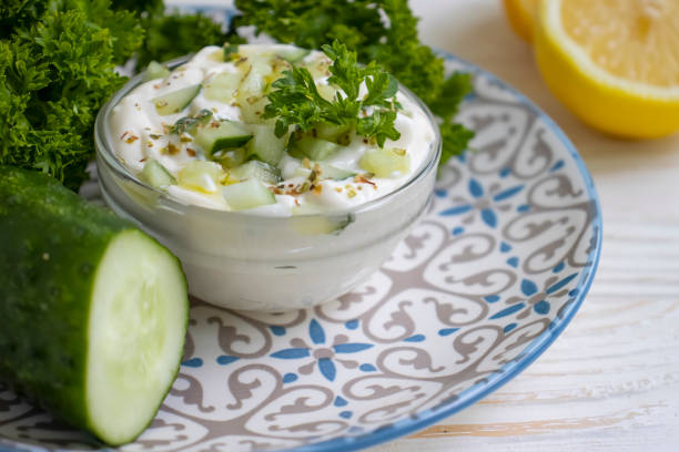 istock tzatziki sauce, lemon, cucumber on concrete background 1326164061