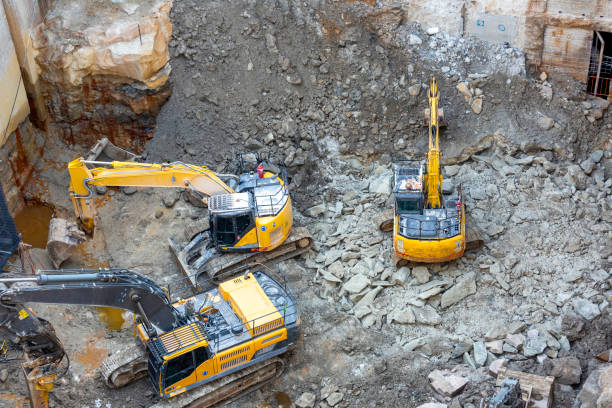 istock Elevated view of construction site with excavators, background with copy space 1326164336