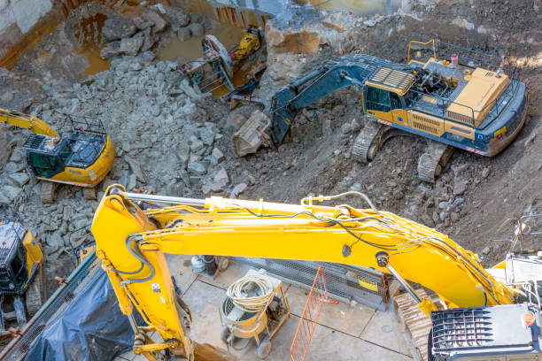 istock Elevated view of construction site with excavators, background with copy space 1326166085