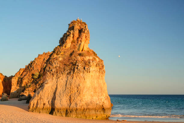 istock Rock in the rays of the setting sun 1326167358