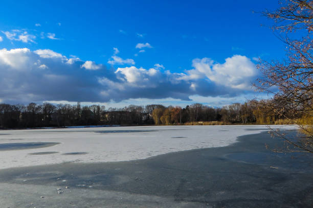 istock Shadow of Clouds on Frozen Lake 1326170289