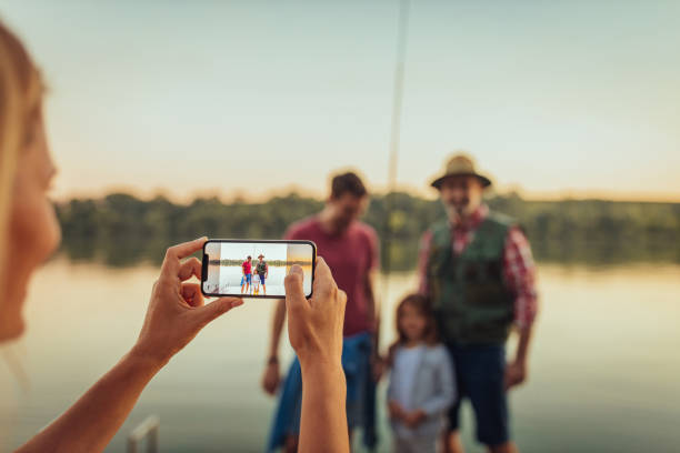 istock Capturing the memories on lake 1326170525