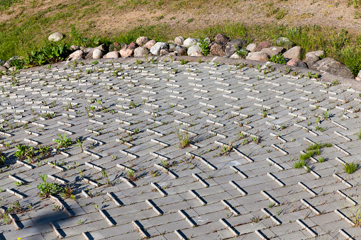 fencing and concrete anchoring on bridges and other structures built on hills