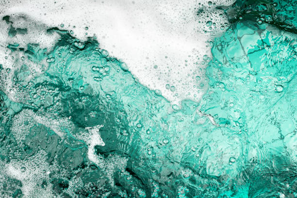 istock Blue sea water white foam texture background closeup, foamy ocean wave pattern, aqua bubbles surface, swimming pool backdrop, abstract summer sunny beach wallpaper, decorative frame border, copy space 1326178193