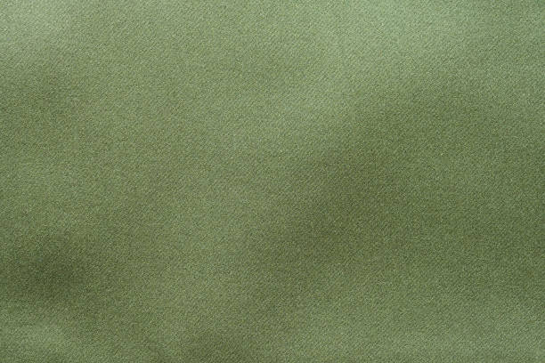 istock Green fabric texture background close up 1326178865