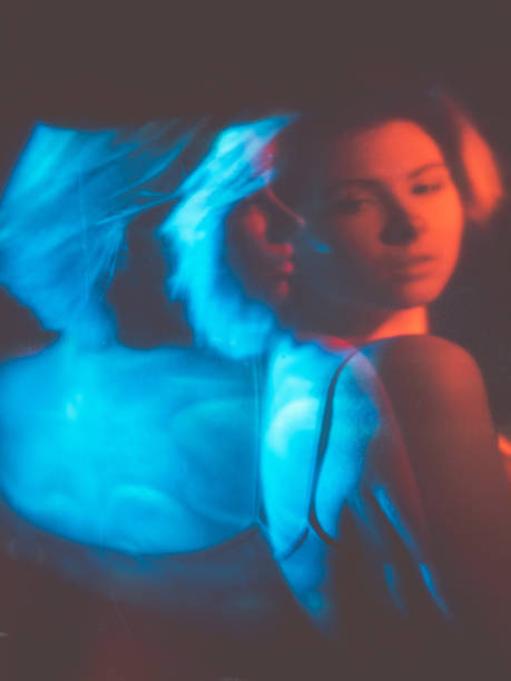 istock anxiety attack disturbed woman in red blue light 1326178939