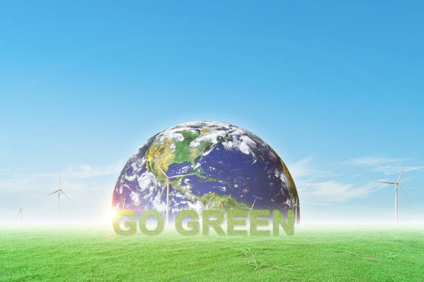 istock Go green and globe on wind turbine field with blue sky background. 1326187181