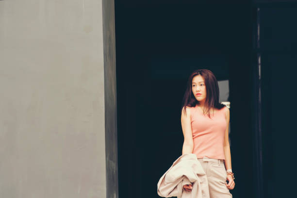 istock Beautiful Woman Going To Work With Walking Near Office Building. 1326192977