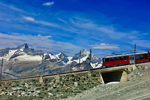 A train run through the mountain