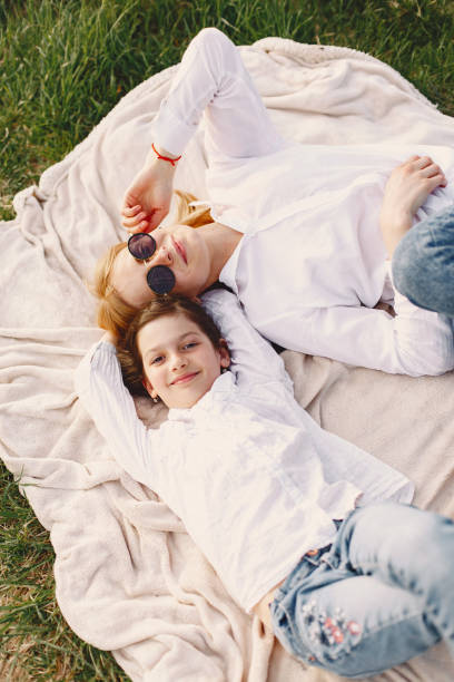 istock Elegant mother with daughter in a summer forest 1326194236