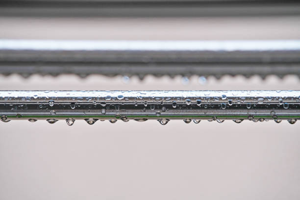 Drop of water which adhered to a clothes polea drop of water on a laundry pole