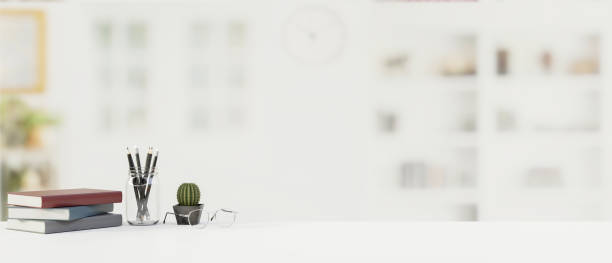 istock Table with stationery, office supplies and copy space with blurred office background, 3D render 1326196928