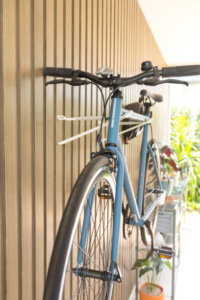 istock Bicycle hanged on wooden wall at house. 1326198417