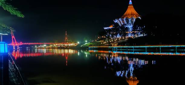 Night strolling in Kuching, Sarawak Had the chance to have night walk along the river, seeing the night scape of the monumen building. kuching waterfront stock pictures, royalty-free photos & images
