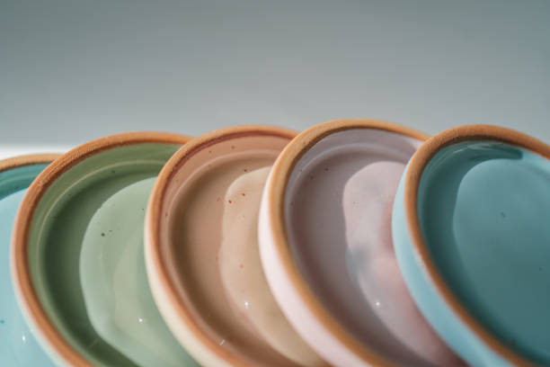 istock A large stack of ceramic cups in pastel colors. 1326200840