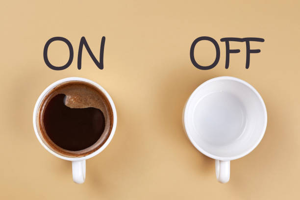 istock Cup filled with coffee and empty cup, lettering on and off. 1326203632