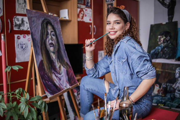 istock Creative young artist painting at home. 1326206219