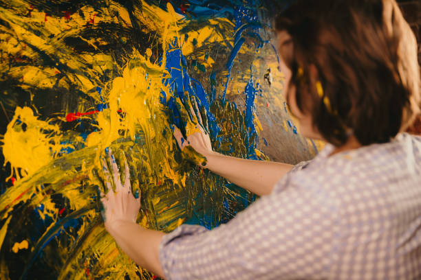 istock Artist drawing with her hands in studio 1326207240