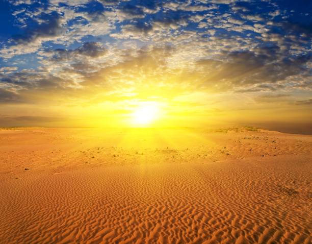istock majestic sunset in a sand desert 1326211187