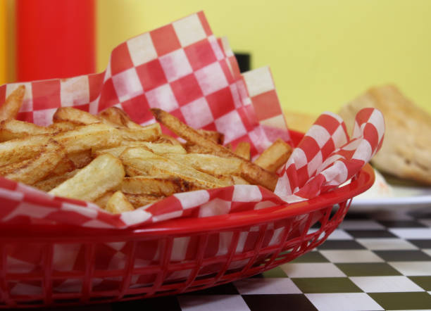 istock Hand Cut French Fried Potatoes in Retro Cafe 1326212040