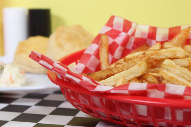 istock Hand Cut French Fried Potatoes in Retro Cafe 1326212063