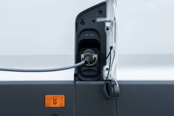istock Charging the white electric delivery van 1326213574