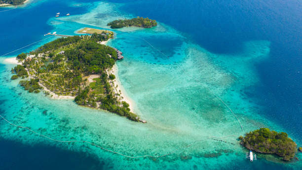 istock Tropical island with beach. Malipano island, Philippines, Samal 1326215304