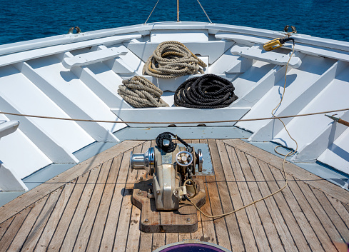 Winch and mooring lines on the deck of a tourist ferry