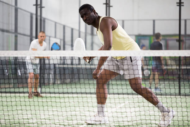 istock African american man playing paddle tennis 1326220105