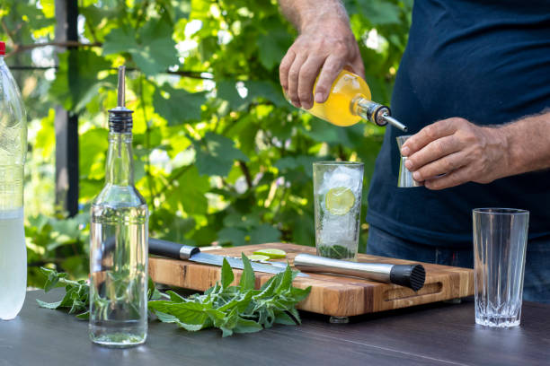 istock Making a cocktail at home. Mojito, alcohol, homemade cocktail, refreshing, non-alcoholic, summer 1326220162