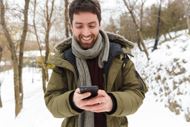 istock Handsome young man wearing winter jacket 1326221206