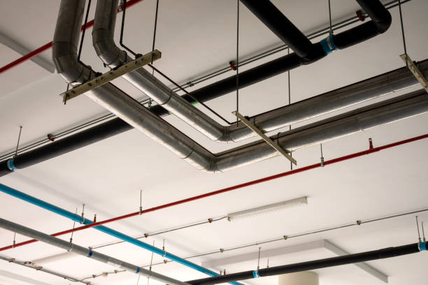 Water and gas pipes system on the ceiling.