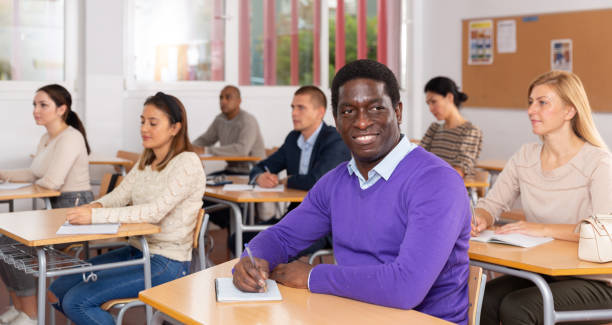 istock African-american student among students in classroom 1326222306