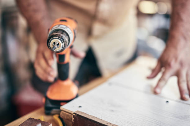 istock Man assembling furniture and fixing it - hobby concept. 1326224657