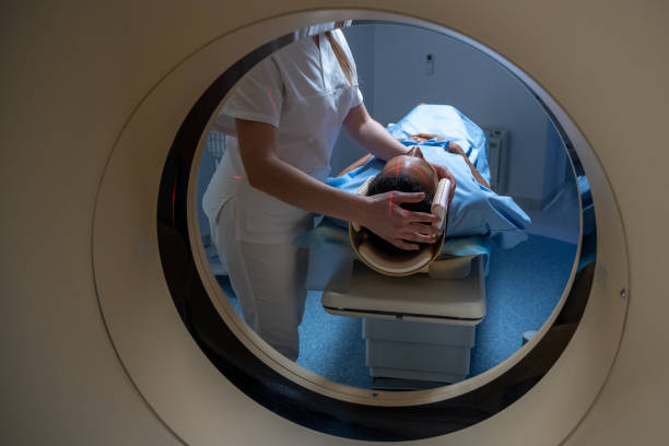 istock Female doctor adjusting and fixing patient's head position 1326232469