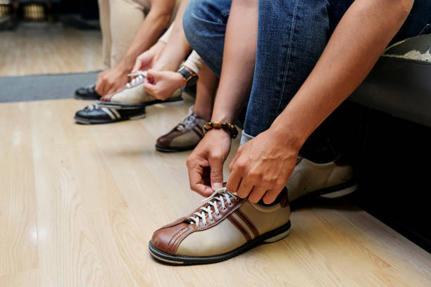 istock People wearing shoes for bowling 1326233366