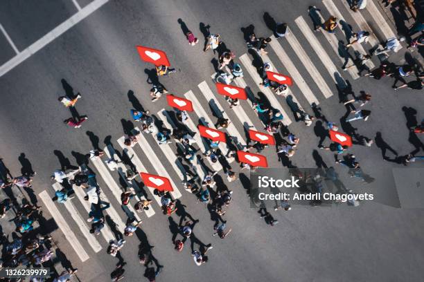 Crowd Of People At Pedestrian Crossing With Social Heart Icons And Likes Overhead Shot Stock Photo - Download Image Now