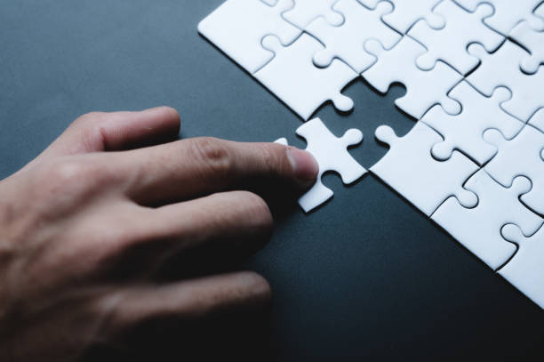 istock business success concept idea of jigsaw puzzle, teamwork solution and join connection, strategy team together, match with cooperation partnership challenge 1326251799