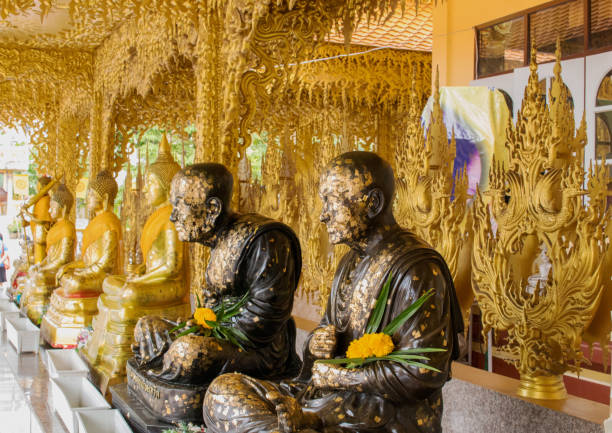 istock Golden Buddha Statue in a Thai Temple 1326251846