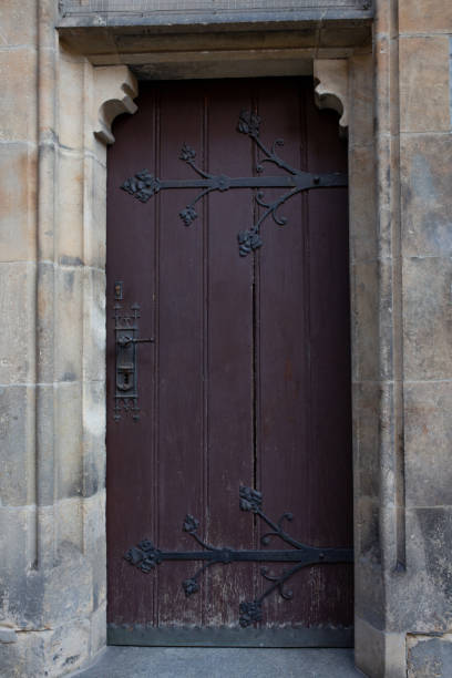 istock Old wooden door with forging 1326253176