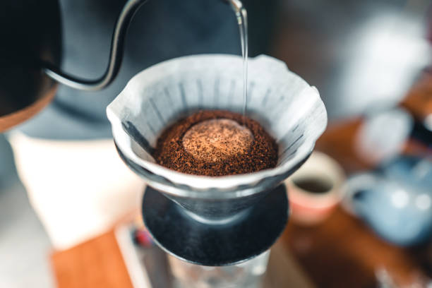 istock Drip Coffee Black coffee brewed in low light in cafe 1326253334
