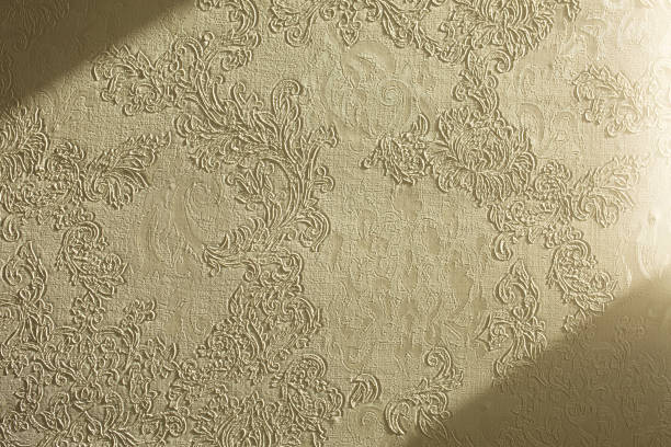 istock Textured wallpaper in the flat. Shadow and light on the wall 1326253689