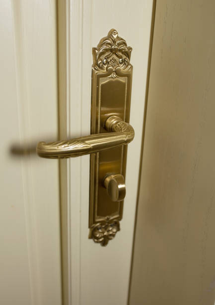 istock Retro style gold handle of a door 1326253991