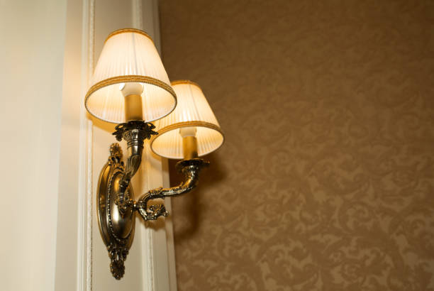 istock Old style wall lamp made from a golden metal 1326254037