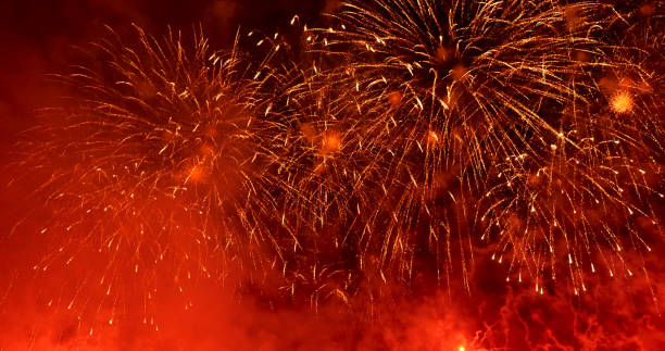 Red Firework celebrate anniversary happy new year 2022, 4th of july holiday festival. red firework in night time celebrate national holiday. Countdown to new year 2022 festival party time event stock photo