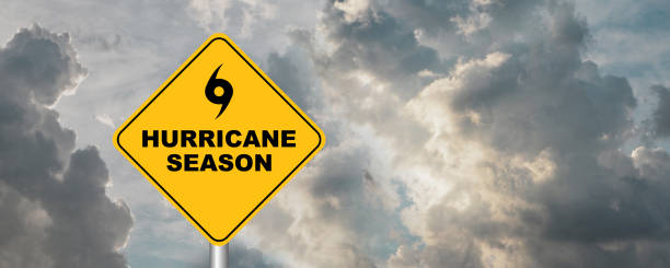 istock hurricane season sign on cloudy background 1326262238