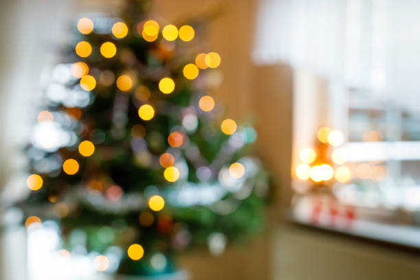 istock Bokeh lights illumination on decorated Christmas tree. Xmas holiday. 1326265832