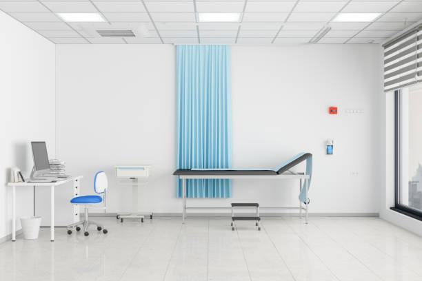 Empty Doctor's Office With Examination Table And Doctor's Desk Empty Doctor's Office With Examination Table And Doctor's Desk doctors office stock pictures, royalty-free photos & images